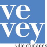 Affiche_Zana_V5-(1)_0000s_0000_CHE_Vevey_Logo.svg